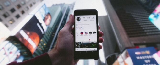 https://unsplash.com/photos/high-angle-photo-of-person-holding-turned-on-smartphone-with-tall-buildings-background-WUmb_eBrpjs social media