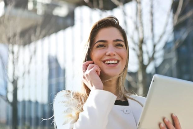 Photo by Andrea Piacquadio: https://www.pexels.com/photo/woman-in-white-blazer-holding-tablet-computer-789822/ - scale content