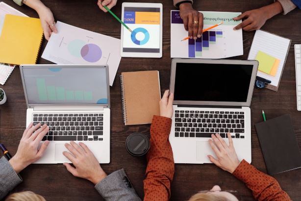 Photo by Mikael Blomkvist: https://www.pexels.com/photo/a-group-of-people-with-graphs-and-pie-charts-on-table-6476258/ - scale content