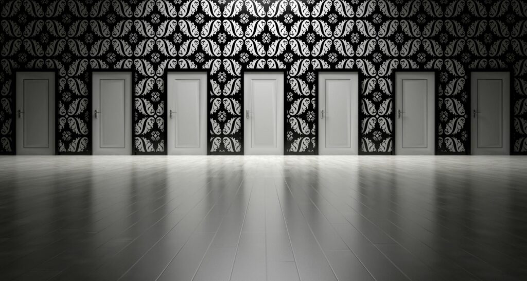 Photo by Pixabay: https://www.pexels.com/photo/seven-white-closed-doors-277593/