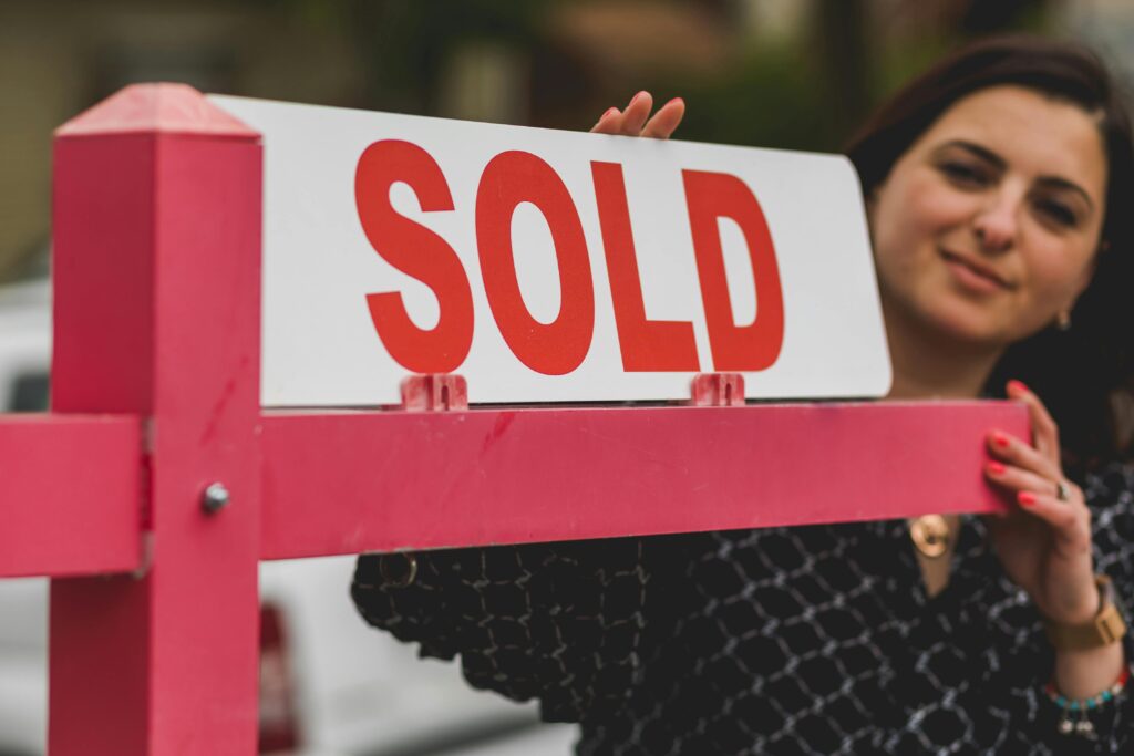 Photo by RDNE Stock project: https://www.pexels.com/photo/real-estate-agent-holding-a-signage-8293694/